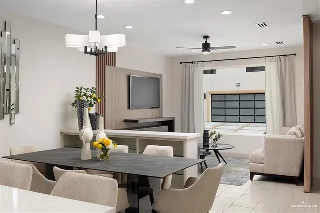 a kitchen with stainless steel appliances kitchen island granite countertop a stove and a sink