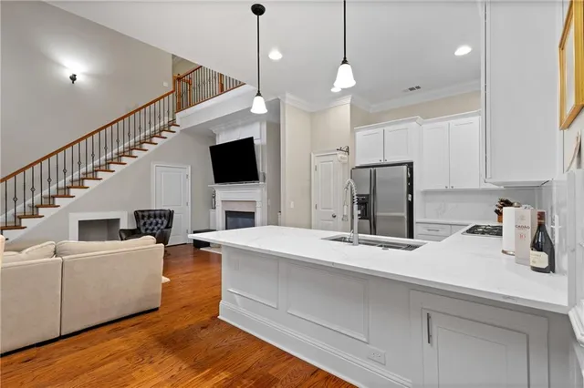 a view of living room with furniture and flat screen tv