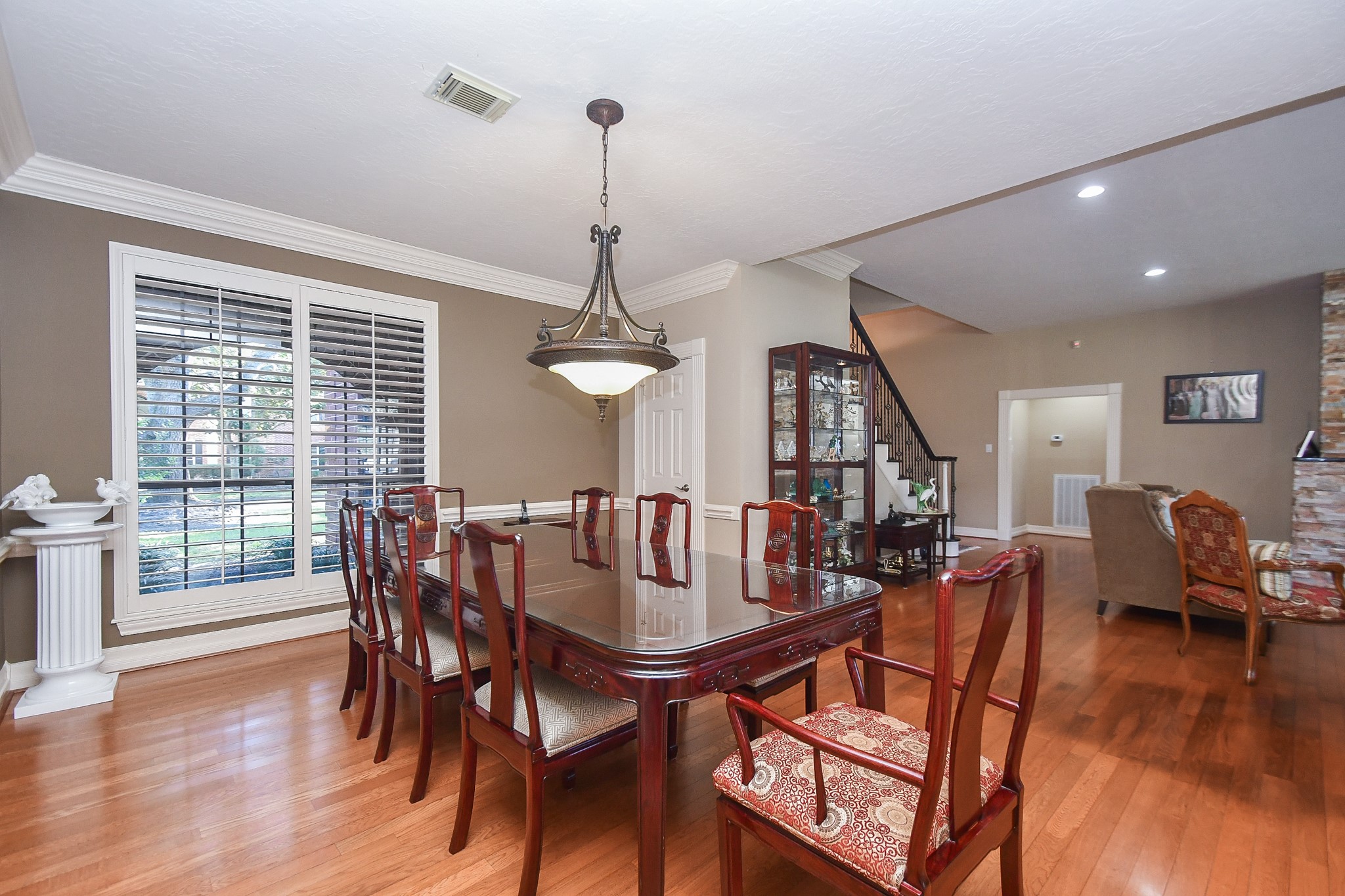 20102 Gable Point Drive Katy, TX 77450 - Photo 11 of 42 a view of a dining room with furniture window and wooden floor