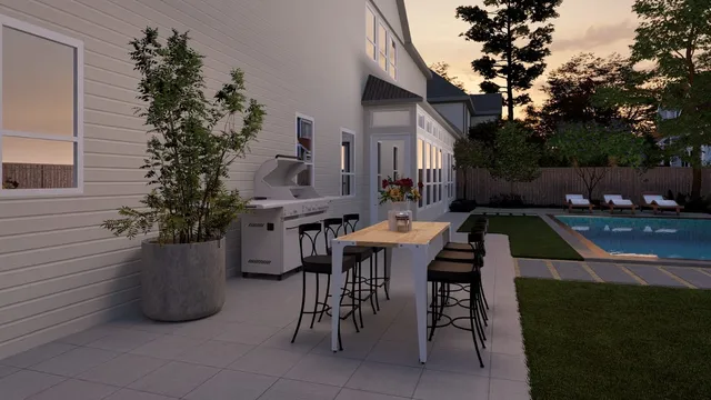 an aerial view of a house with outdoor space