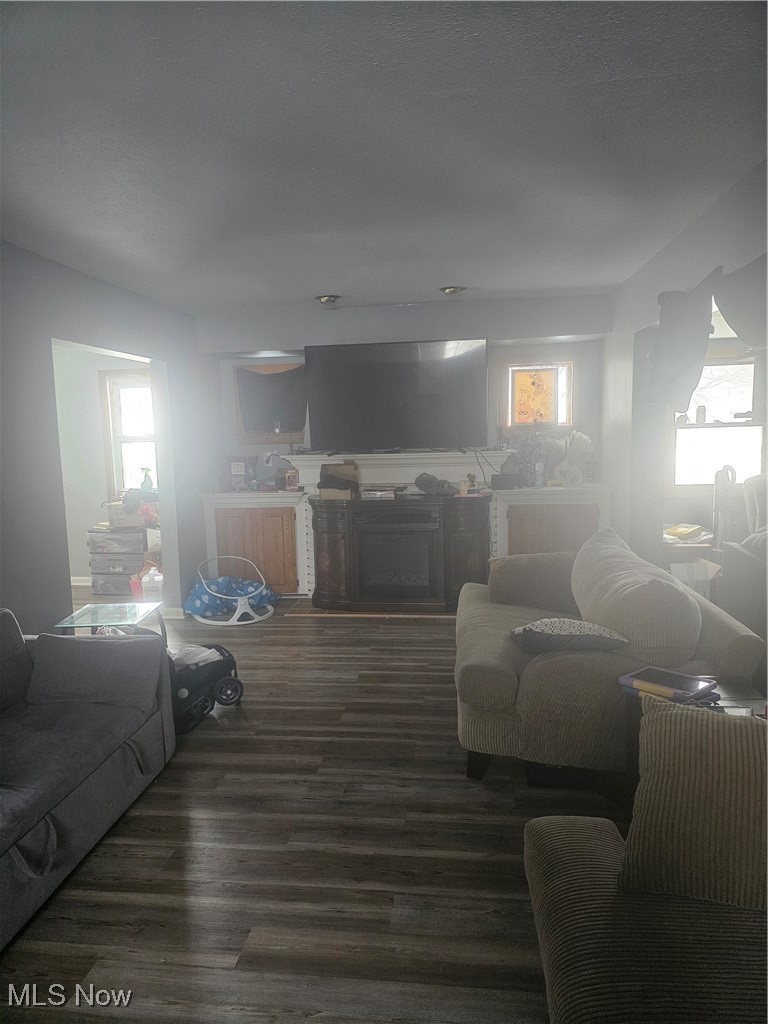 25150 Columbus Road Bedford Heights, OH 44146 - Photo 12 of 30 Living area featuring dark wood finished floors