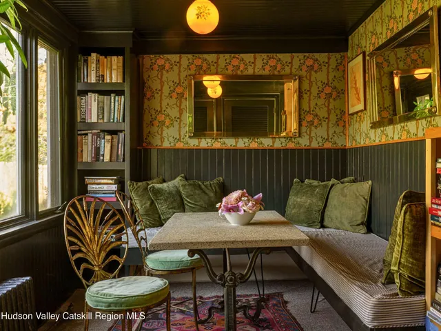 a view of a chairs and table in a patio