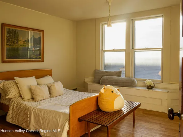 a view of a backyard with plants and a patio