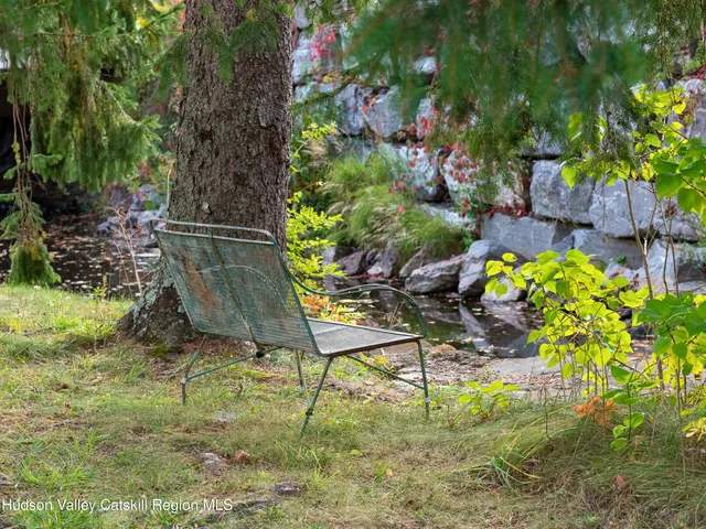 a view of a field with trees
