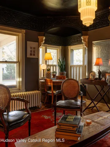 a view of a living room with furniture