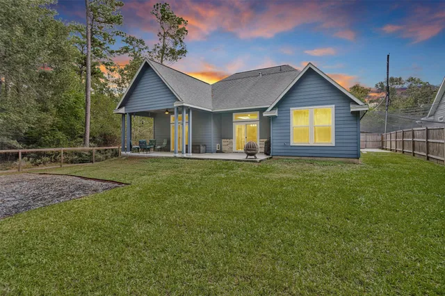 a front view of a house with yard
