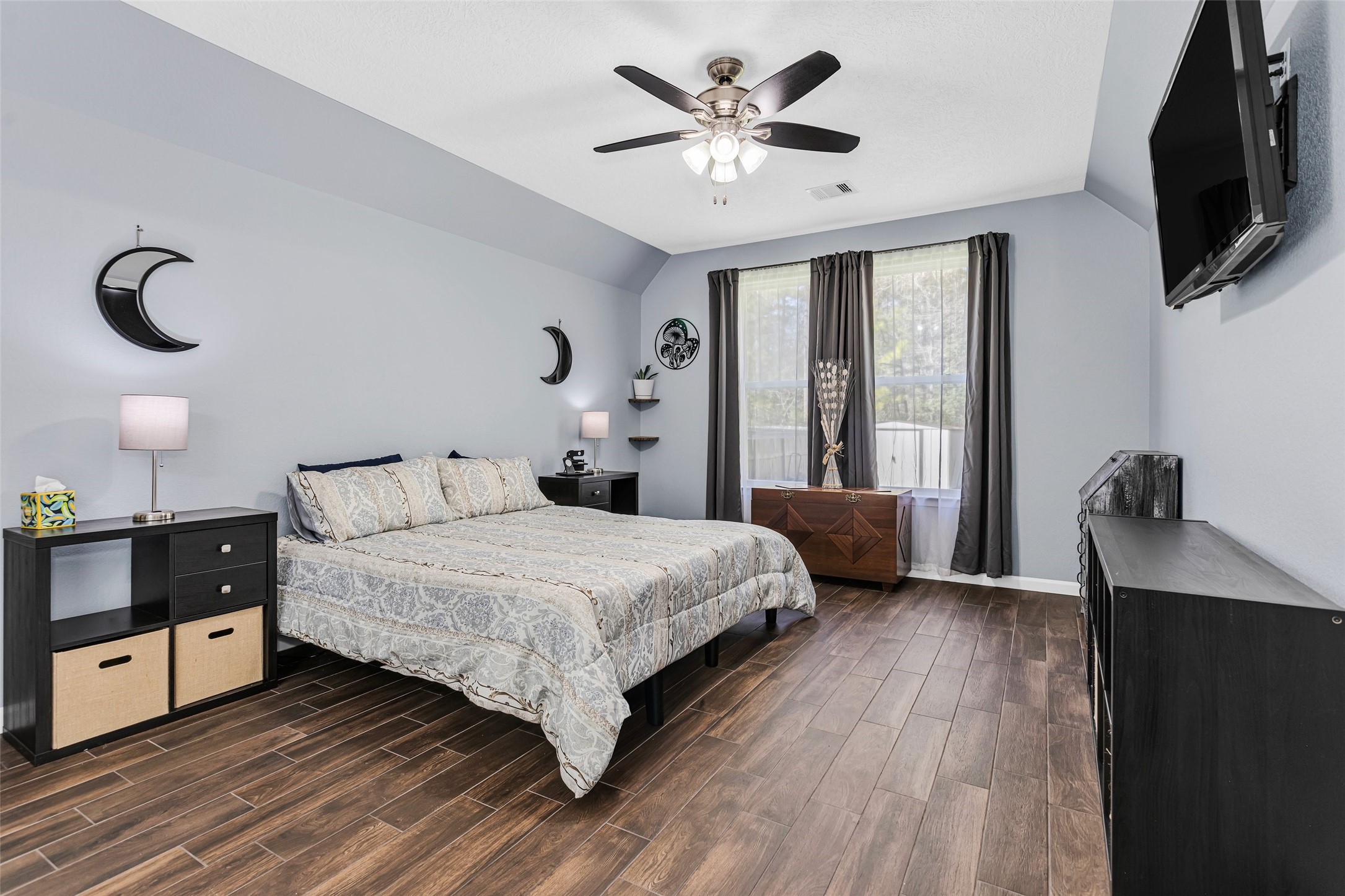 1057 Magnolia Point Drive Huffman, TX 77336 - Photo 27 of 48 This is your cozy primary bedroom
