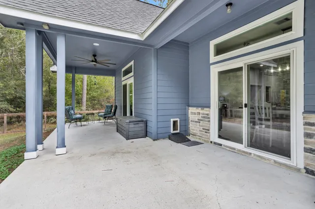 a view of a building with porch and outdoor space