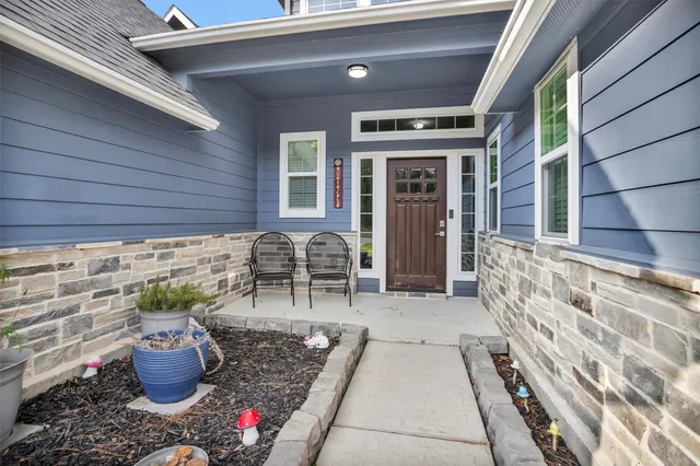 a potted plant sitting in front of a building