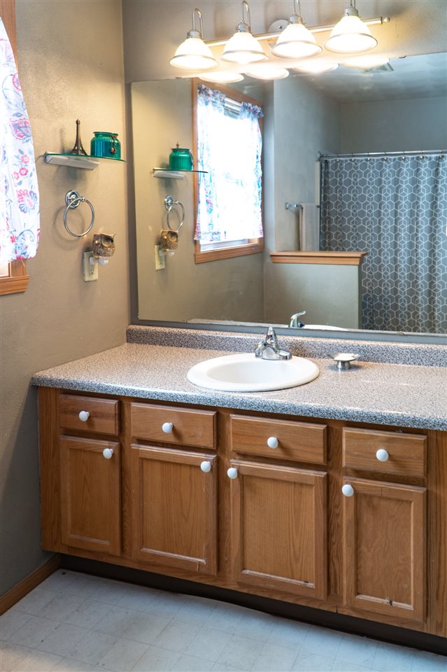696 Bayfield Road Rockton, IL 61072 - Photo 15 of 20 a sink with a cabinets