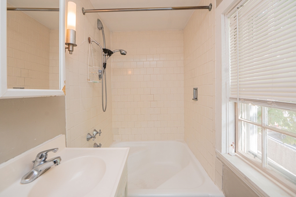 6 Merritt Street Marblehead, MA 01945 - Photo 17 of 31 a bathroom with a bathtub and shower