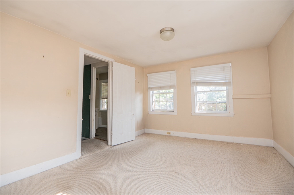 6 Merritt Street Marblehead, MA 01945 - Photo 21 of 31 an empty room with windows