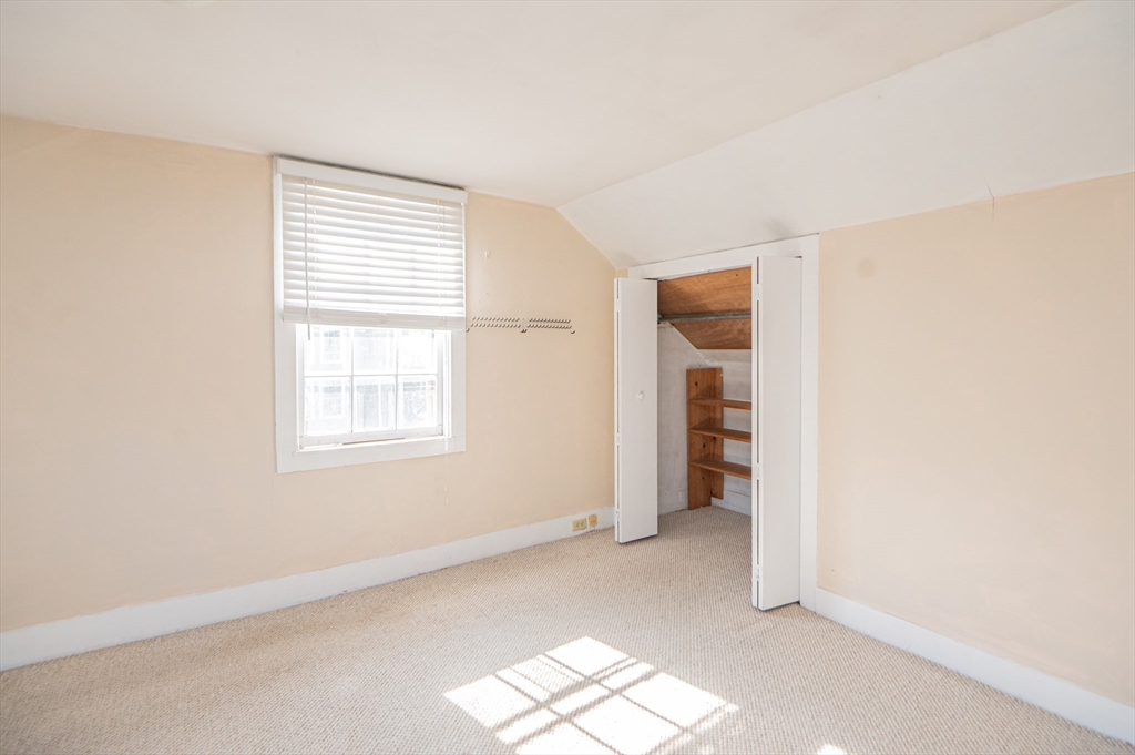 6 Merritt Street Marblehead, MA 01945 - Photo 22 of 31 a view of livingroom with furniture and window