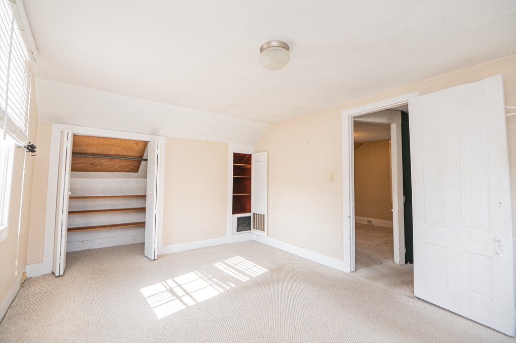 6 Merritt Street Marblehead, MA 01945 - Photo 25 of 31 a view of an empty room with a closet