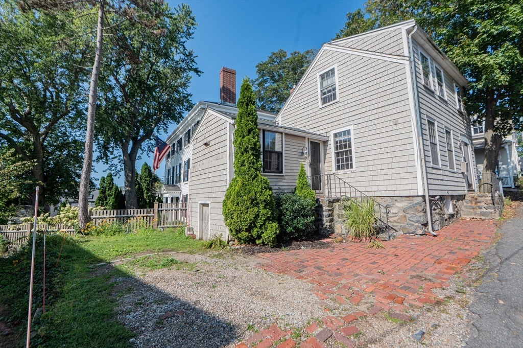 6 Merritt Street Marblehead, MA 01945 - Photo 30 of 31 a view of a house with backyard and trees
