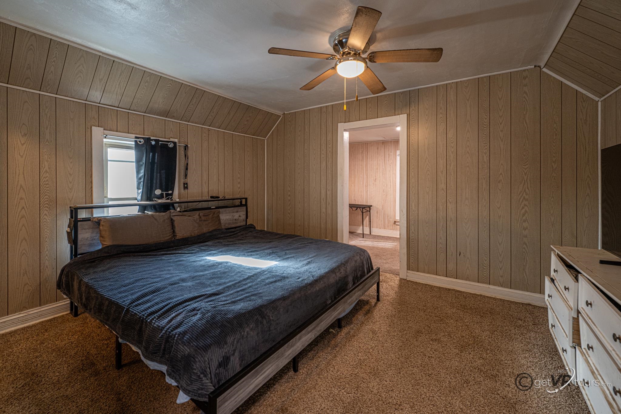 520 South Burchard Avenue Freeport, IL 61032 - Photo 18 of 25 a bed room with a bed and a television