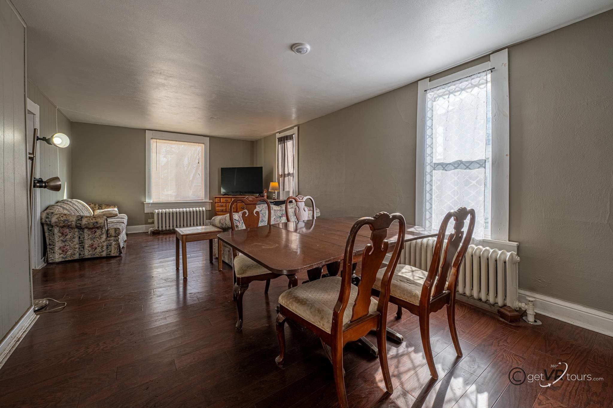 520 South Burchard Avenue Freeport, IL 61032 - Photo 6 of 25 a view of a a dining room with furniture window and wooden floor