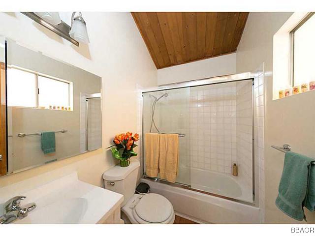26652 Valley View Lake Rimforest, CA 92378 - Photo 8 of 17 a bathroom with a toilet and a shower