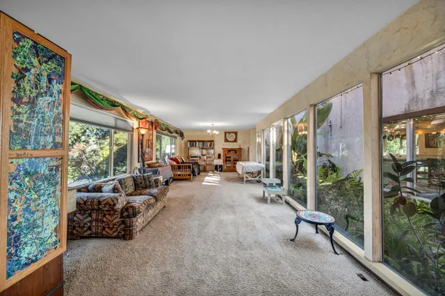 a bed room with a bed and window