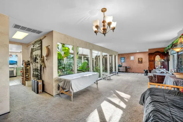 a view of a yard with an outdoor space