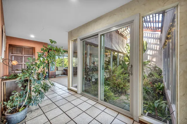 a view of a street with a building in the background