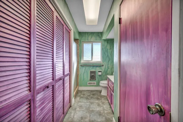 a backyard of a house with yard and outdoor seating