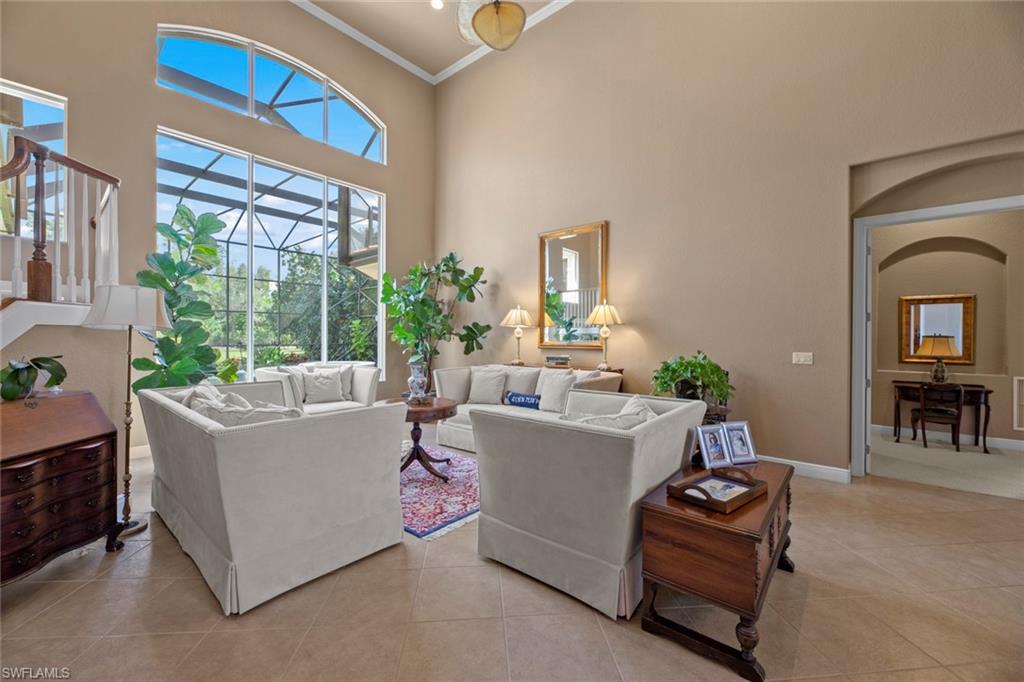19260 La Serena Drive Estero, FL 33967 - Photo 13 of 48 a living room with furniture and a large window