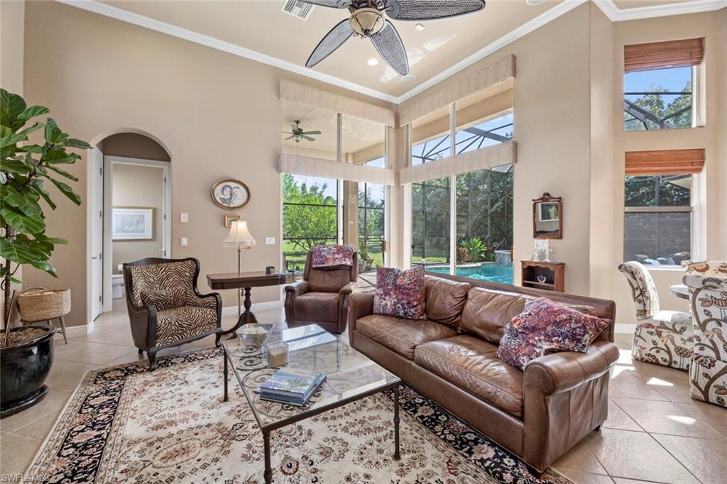 19260 La Serena Drive Estero, FL 33967 - Photo 24 of 48 a living room with furniture and a large window