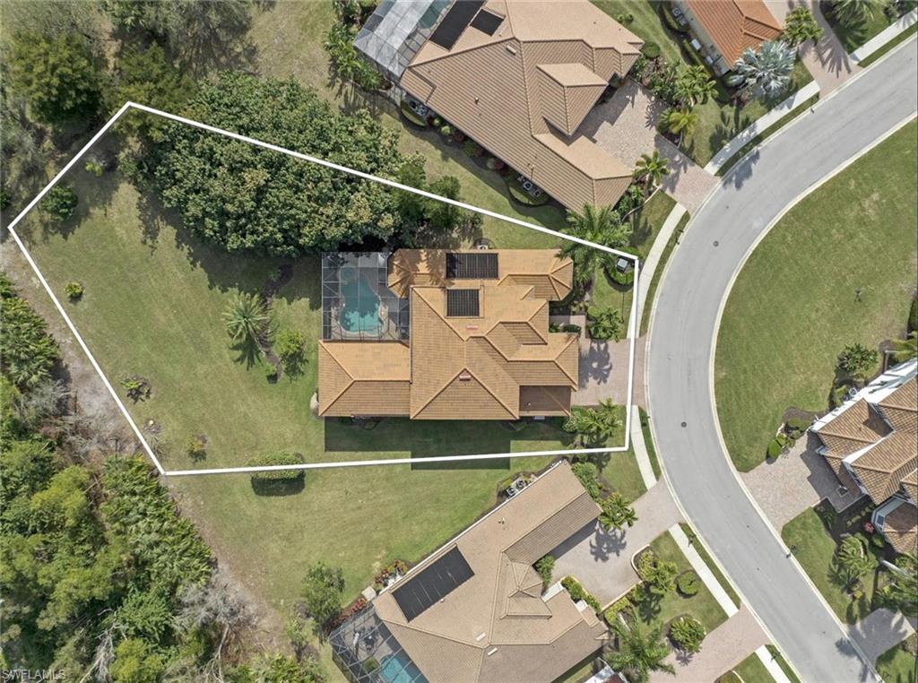 19260 La Serena Drive Estero, FL 33967 - Photo 5 of 48 an aerial view of a house with outdoor space