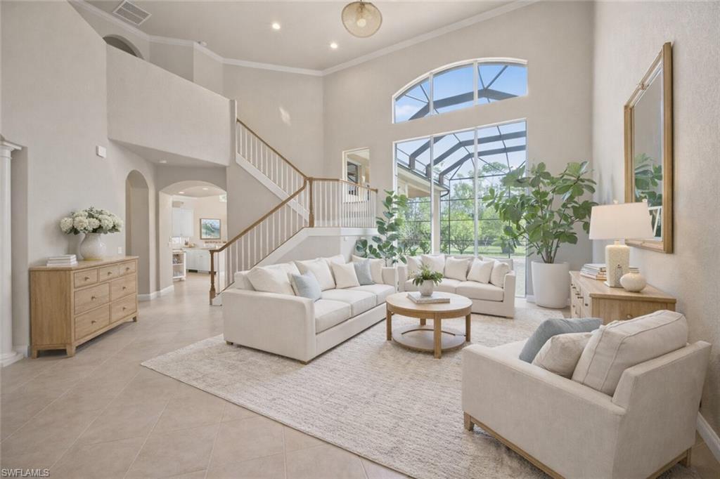 19260 La Serena Drive Estero, FL 33967 - Photo 6 of 48 a living room with furniture and a large window