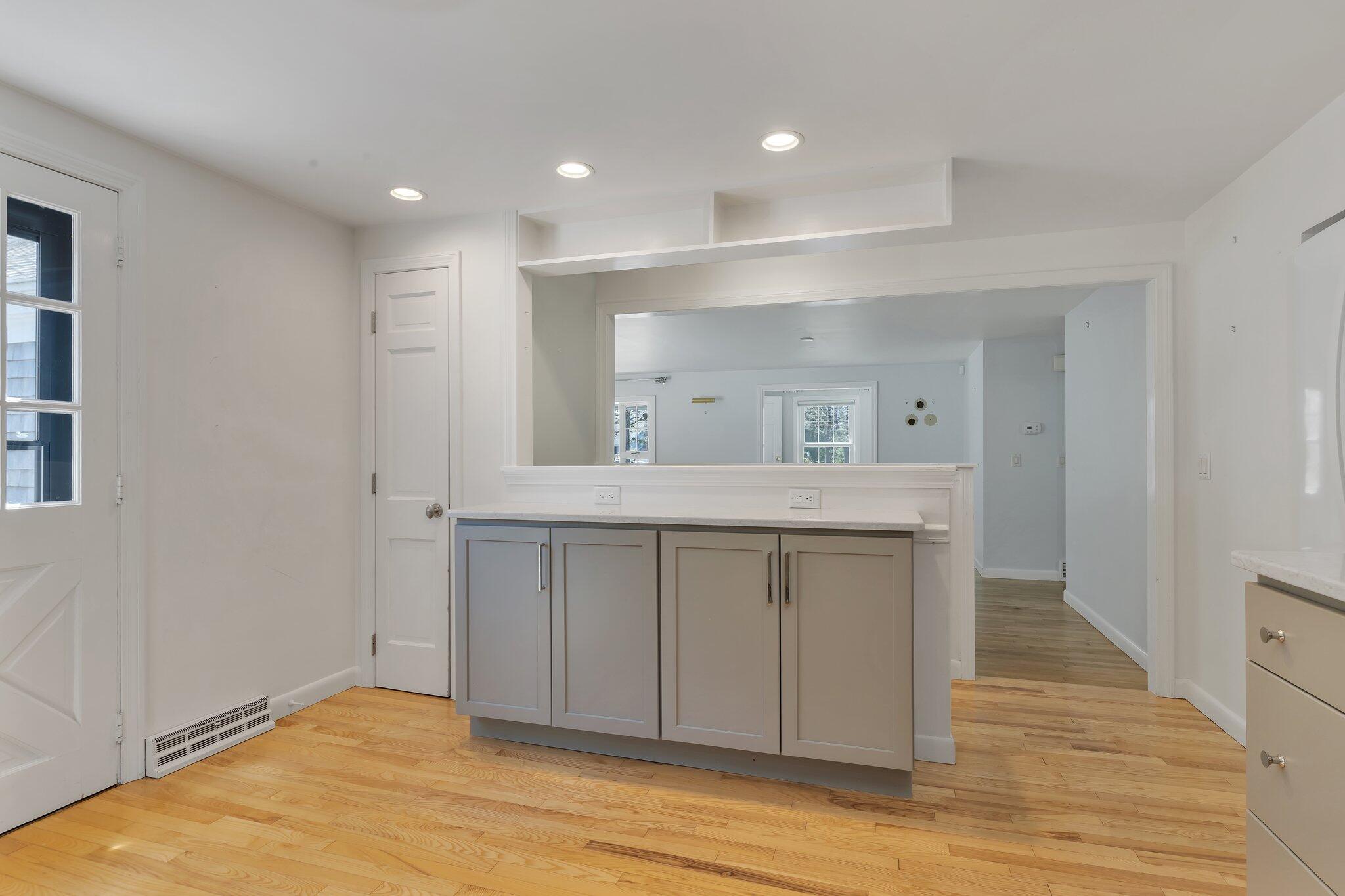 248 Chippingstone Road Chatham, MA 02633 - Photo 10 of 26 a bathroom with a sink and a mirror