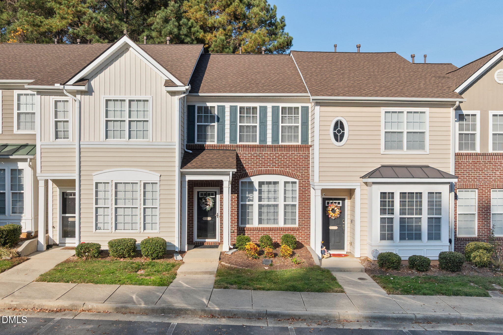 4424 Sugarbend Way Raleigh, NC 27606 - Photo 1 of 38 a front view of a house with yard