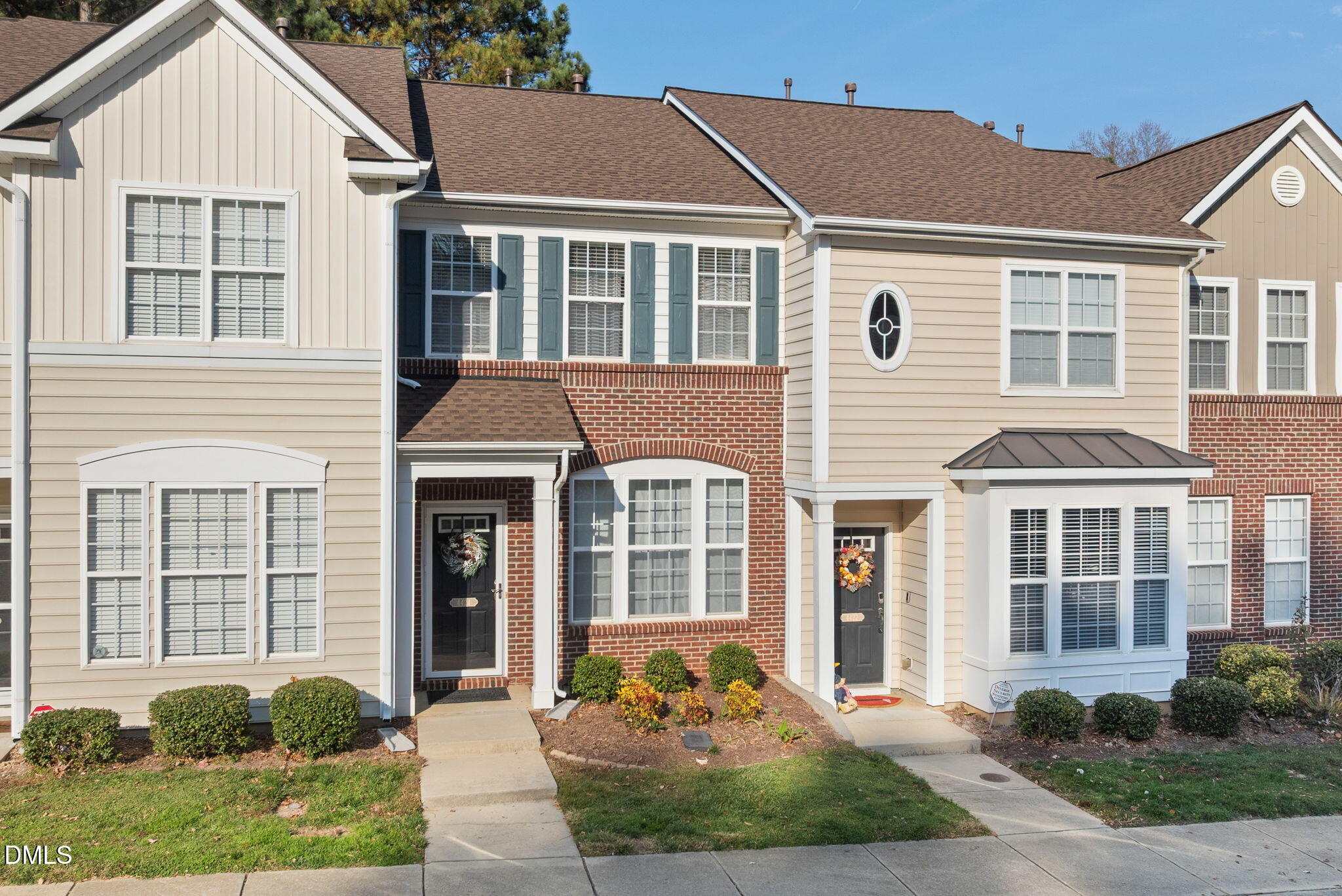 4424 Sugarbend Way Raleigh, NC 27606 - Photo 3 of 38 a front view of a house with yard and green space