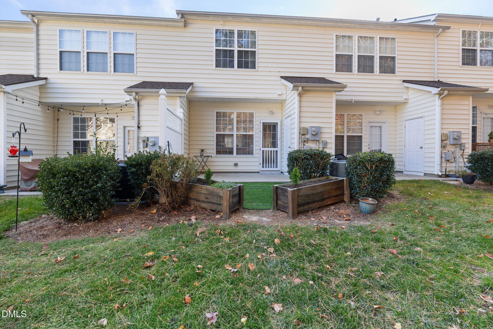 4424 Sugarbend Way Raleigh, NC 27606 - Photo 32 of 38 front view of a house with a yard
