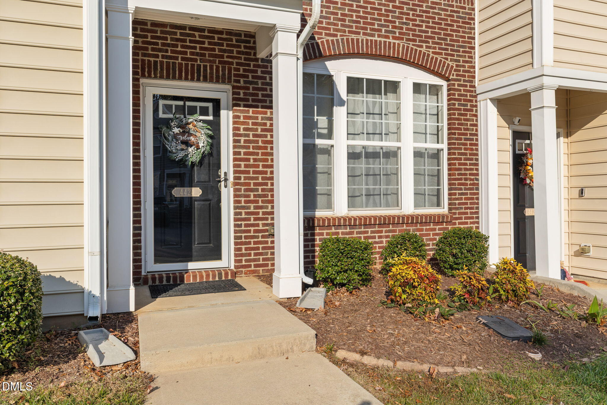 4424 Sugarbend Way Raleigh, NC 27606 - Photo 5 of 38 a front view of a house with a yard