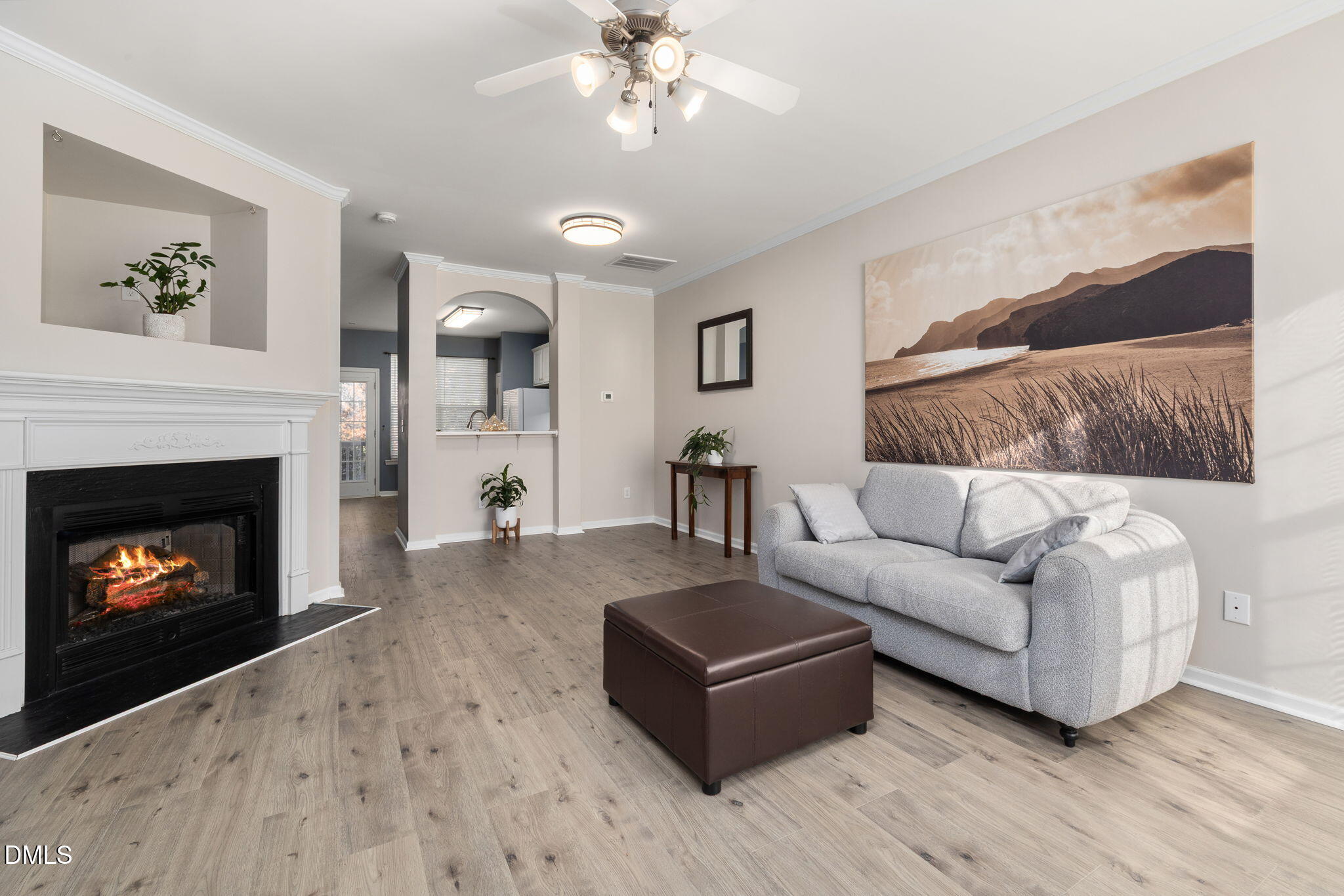 4424 Sugarbend Way Raleigh, NC 27606 - Photo 6 of 38 a living room with furniture and a fireplace