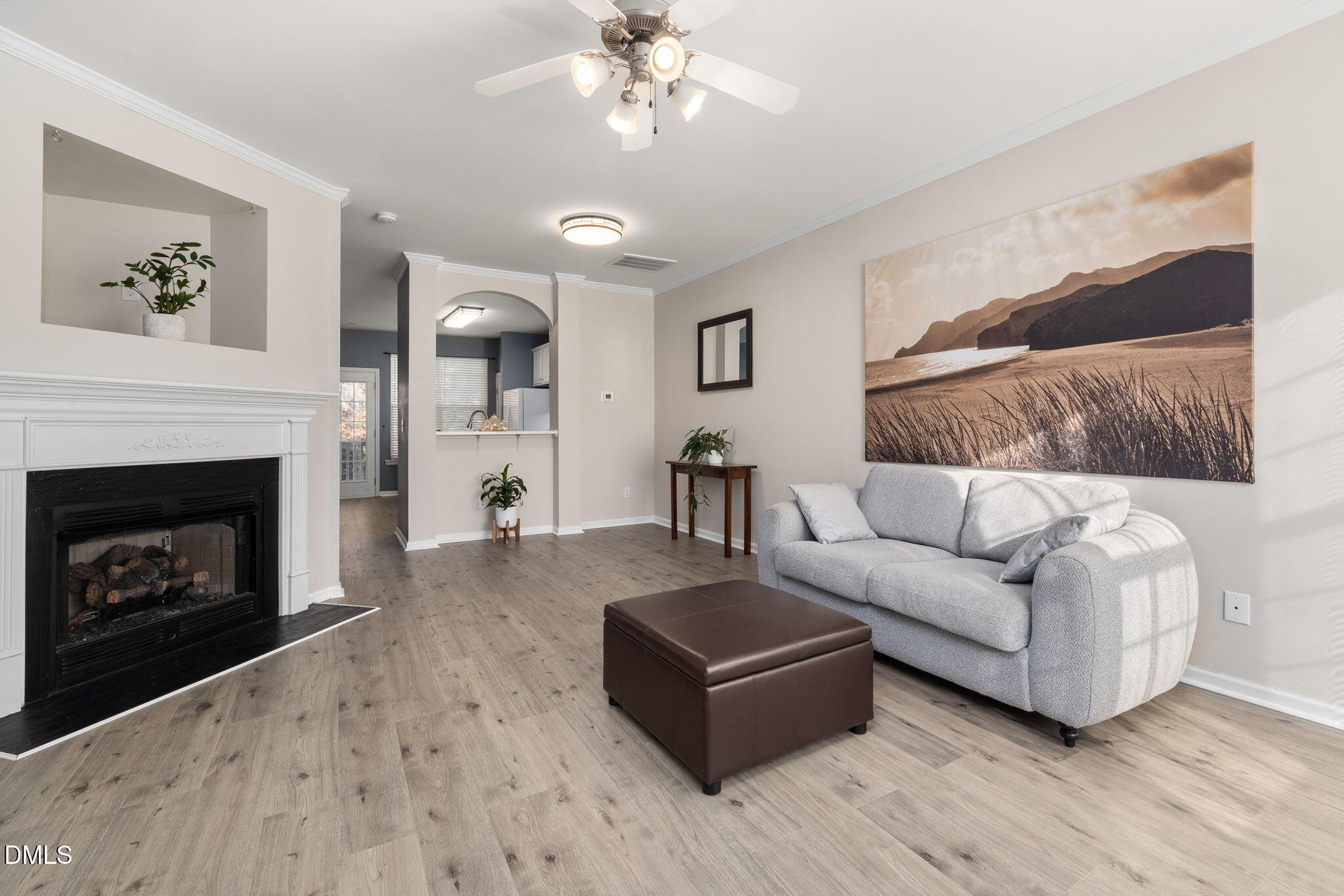 4424 Sugarbend Way Raleigh, NC 27606 - Photo 7 of 38 a living room with furniture and a fireplace