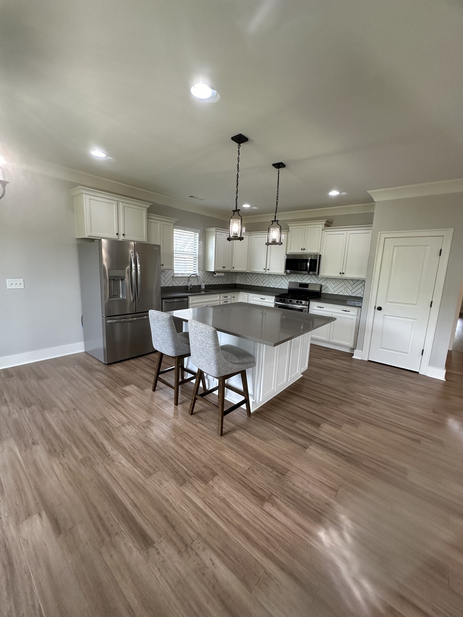 716 Plowson Road Mount Juliet, TN 37122 - Photo 12 of 40 Kitchen with bar. Room for 4 bar stools and extra storage