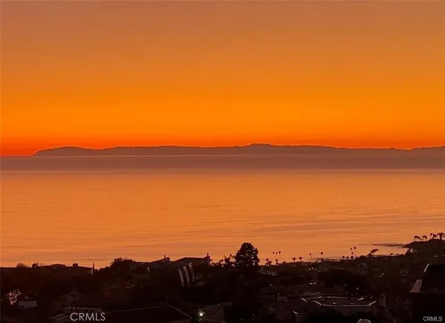 a view of lake and mountain
