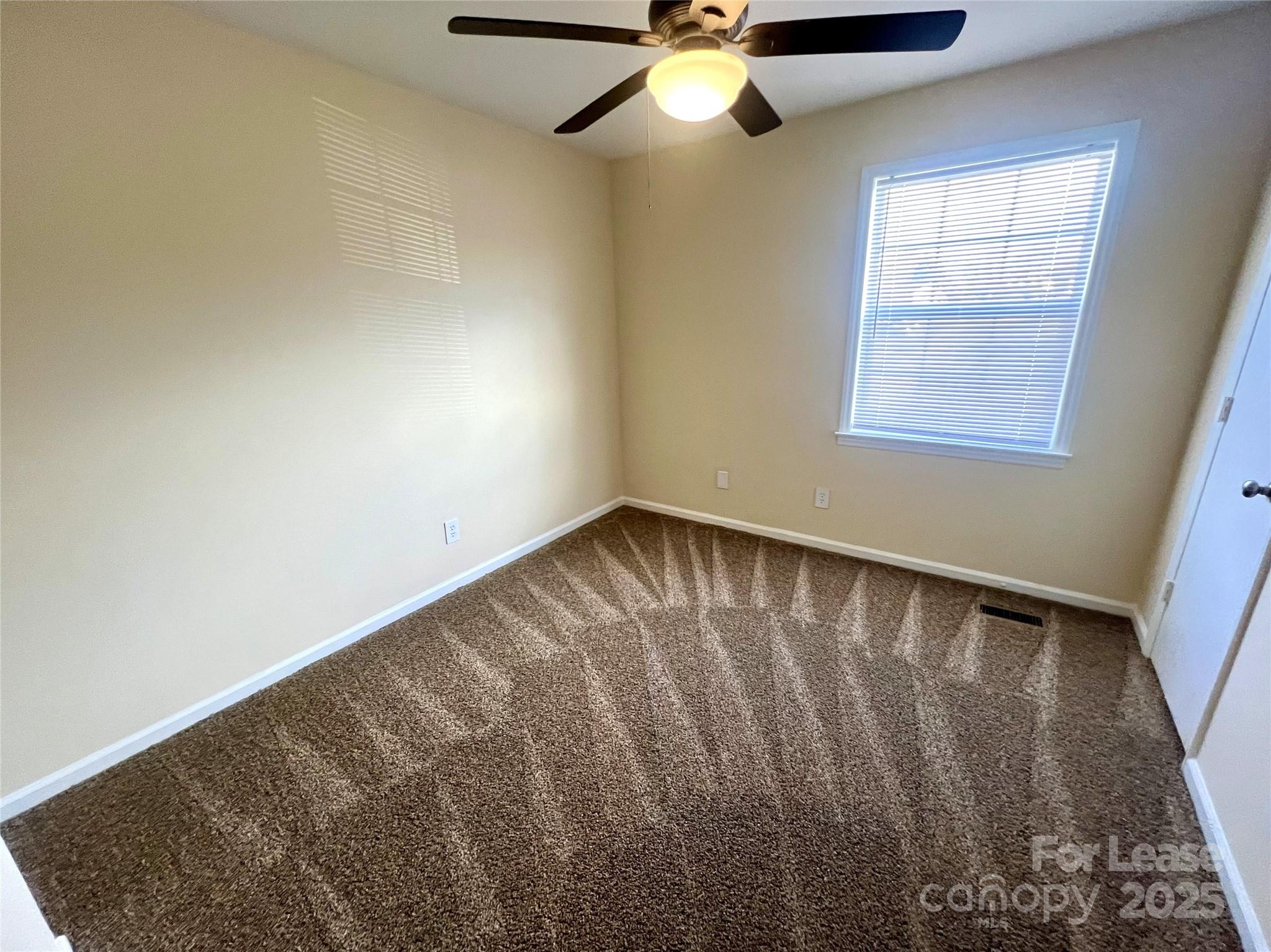 250 Nixon Road, Unit 34 Belmont, NC 28012 - Photo 7 of 11 a view of an empty room with a window