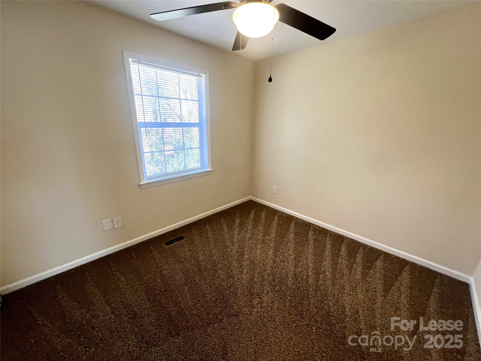 250 Nixon Road, Unit 34 Belmont, NC 28012 - Photo 10 of 11 an empty room with a window