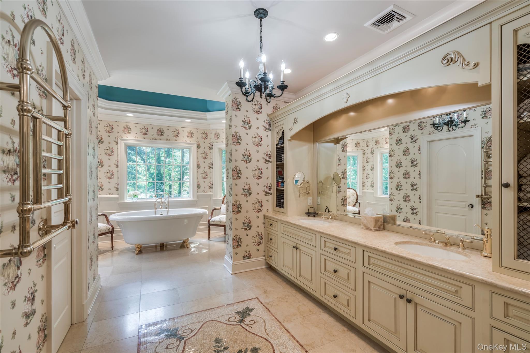 178 Brookville Road Muttontown, NY 11545 - Photo 15 of 29 a spacious bathroom with a double vanity sink large mirror and a bathtub