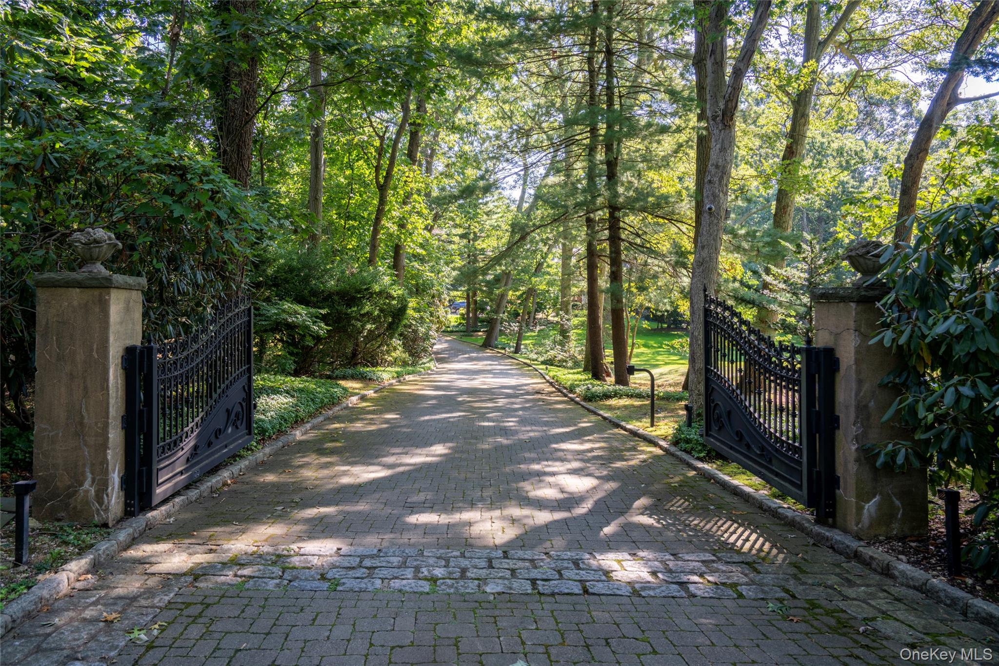 178 Brookville Road Muttontown, NY 11545 - Photo 28 of 29 a view of a pathway with a yard