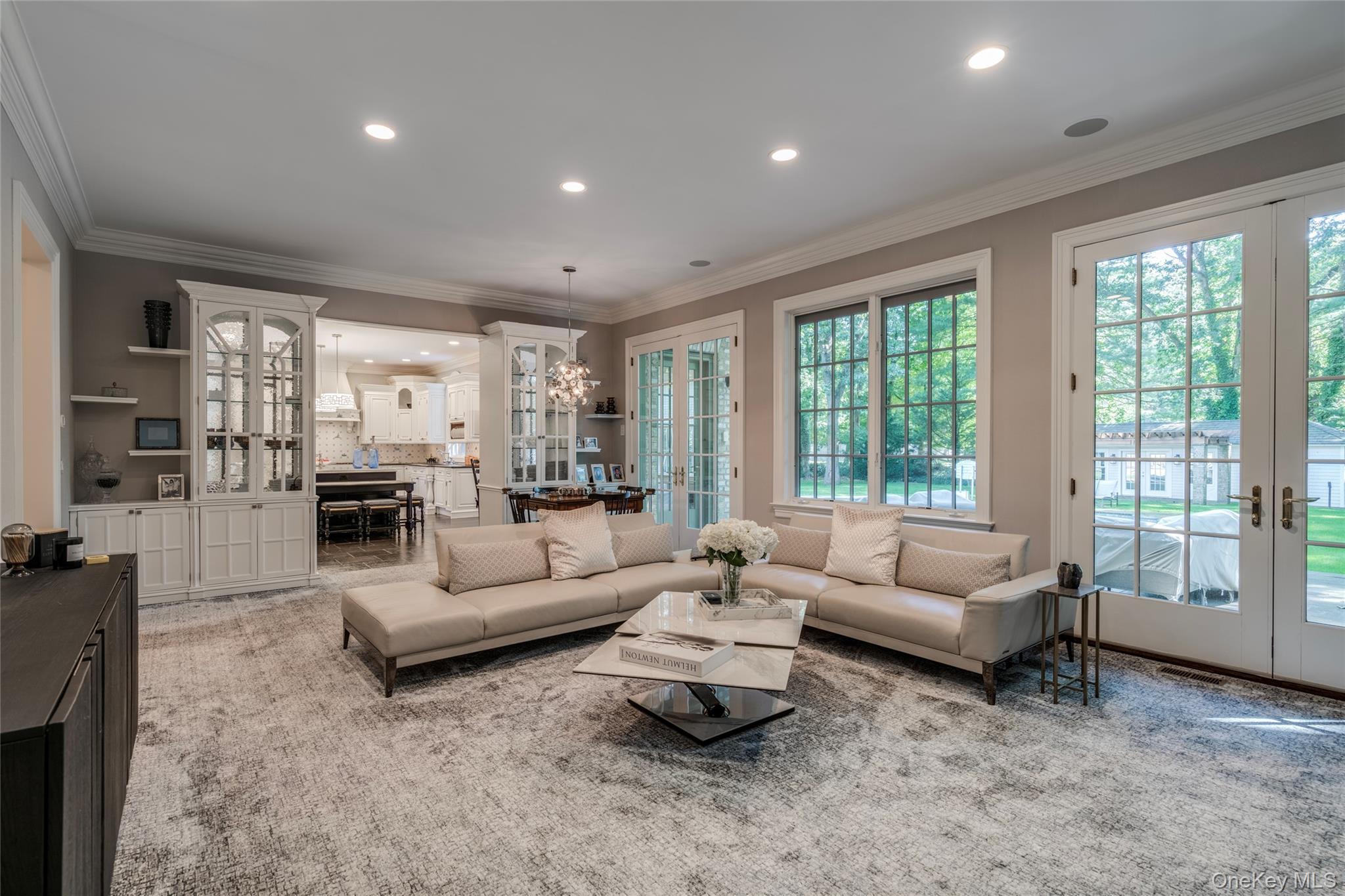 178 Brookville Road Muttontown, NY 11545 - Photo 8 of 29 a living room with furniture and large windows