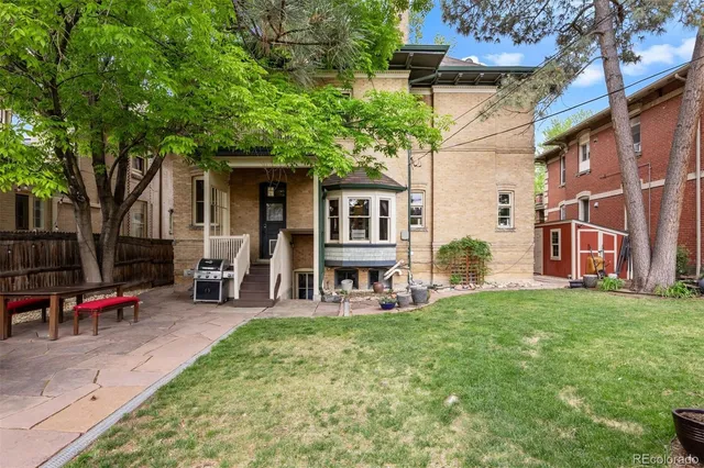 a view of outdoor sitting area with furniture