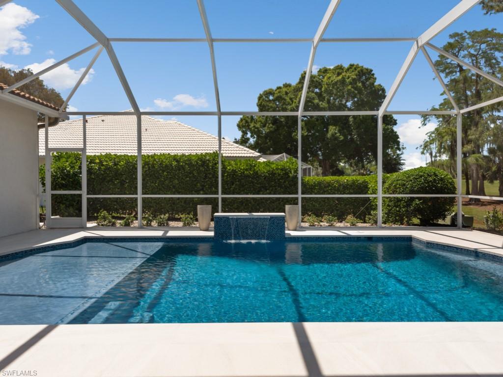 206 Palmetto Dunes Circle Naples, FL 34113 - Photo 25 of 34 a house view with a garden space and pool table