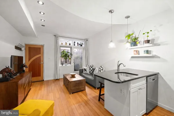 a view of a bathroom with a hallway