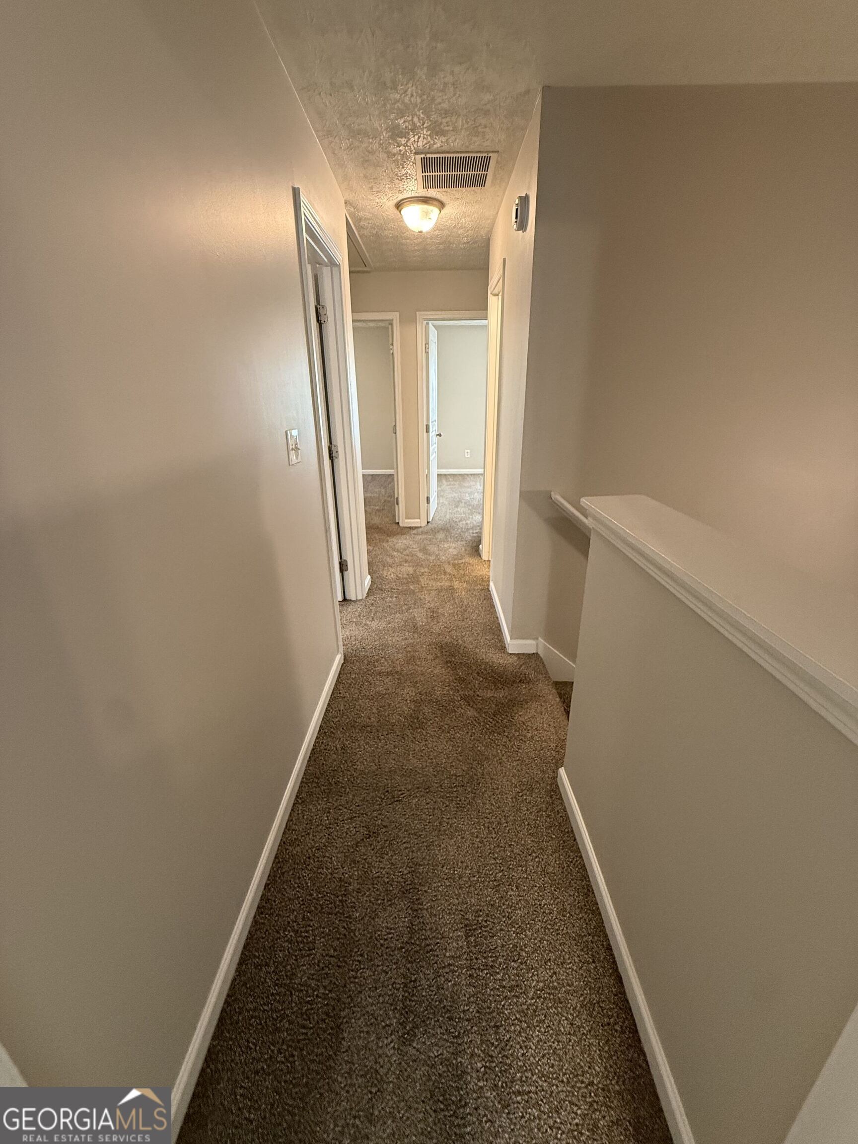 6132 Ruth Street Southwest Covington, GA 30014 - Photo 23 of 33 a view of a hallway