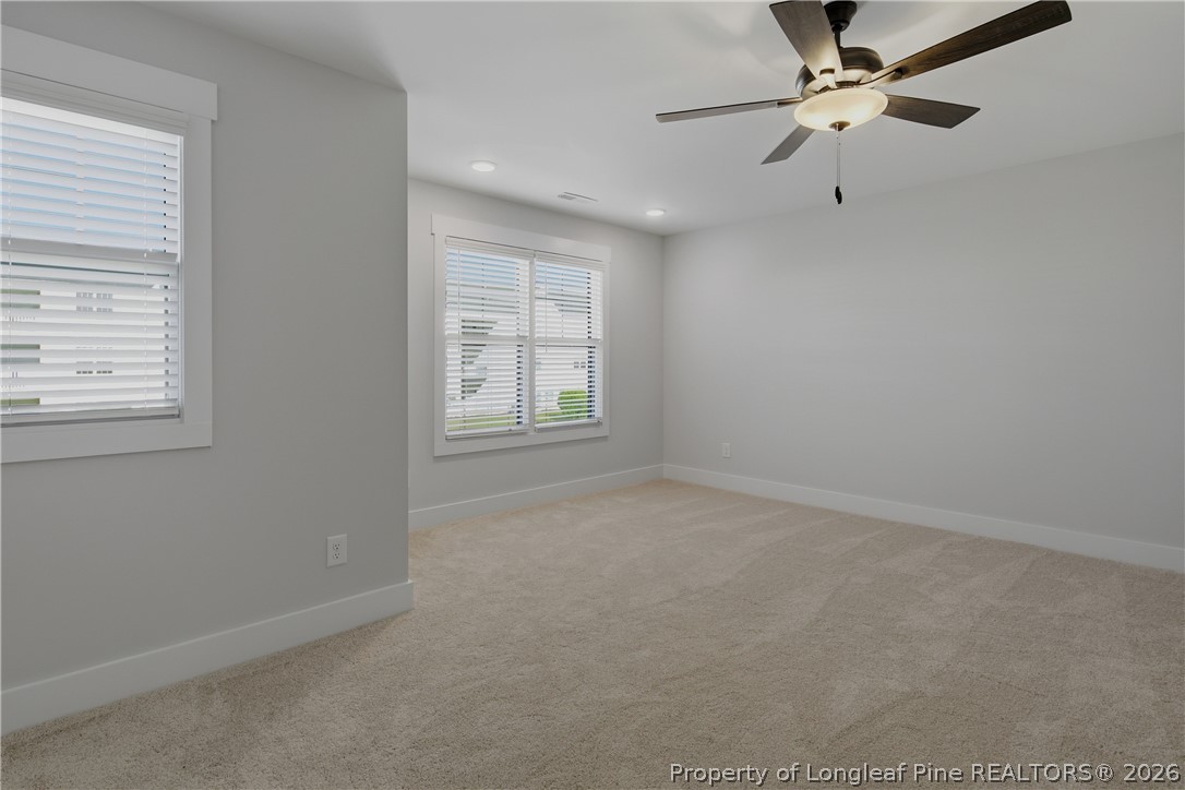 3931 Hamilton Street Hope Mills, NC 28348 - Photo 29 of 50 an empty room with windows and fan
