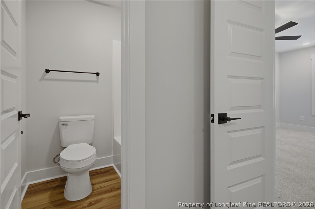 3931 Hamilton Street Hope Mills, NC 28348 - Photo 35 of 50 a bathroom with a toilet and a shower